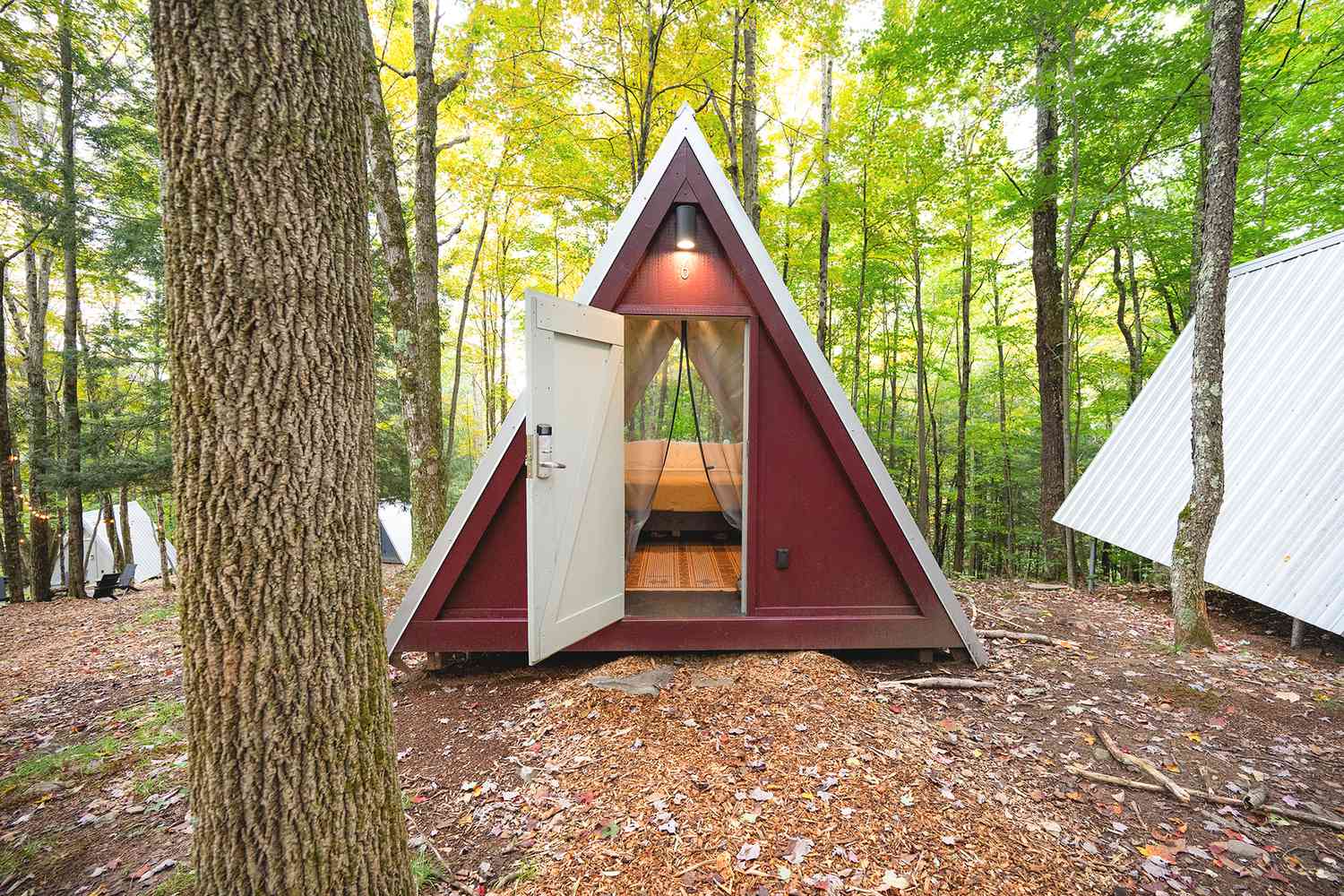 This Upstate New York City Resort Has New A-frame Cabins Embed In a 23-acre Woodland– With Floor-to-ceiling Windows, Fire Pits, and Saunas